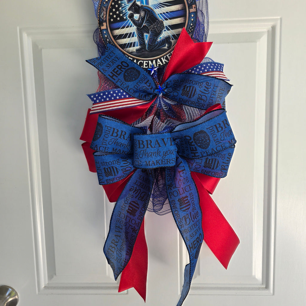 Opposite side angle view of Thin Blue Line door swag on white door