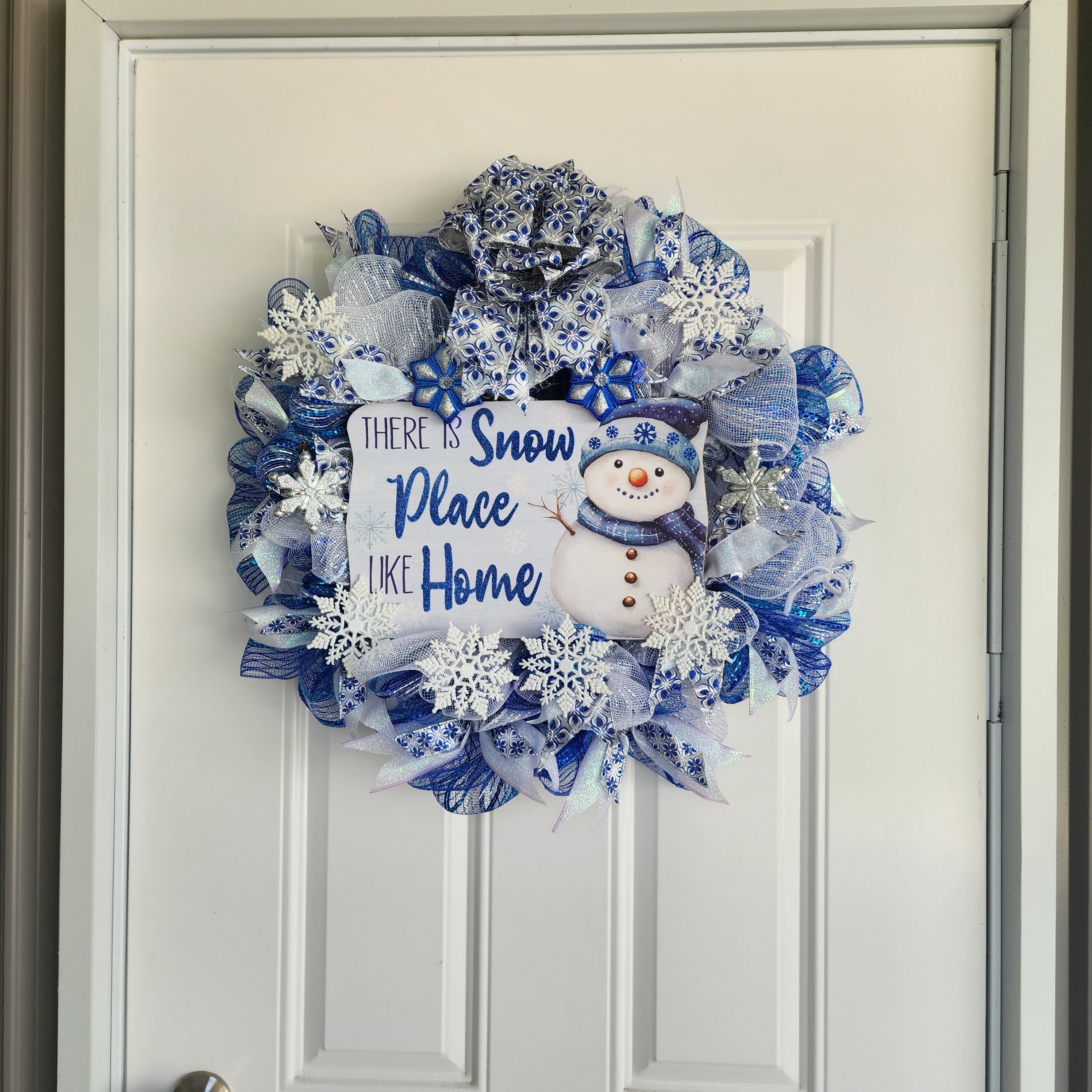 Full wreath detail showing mesh layers and ornaments