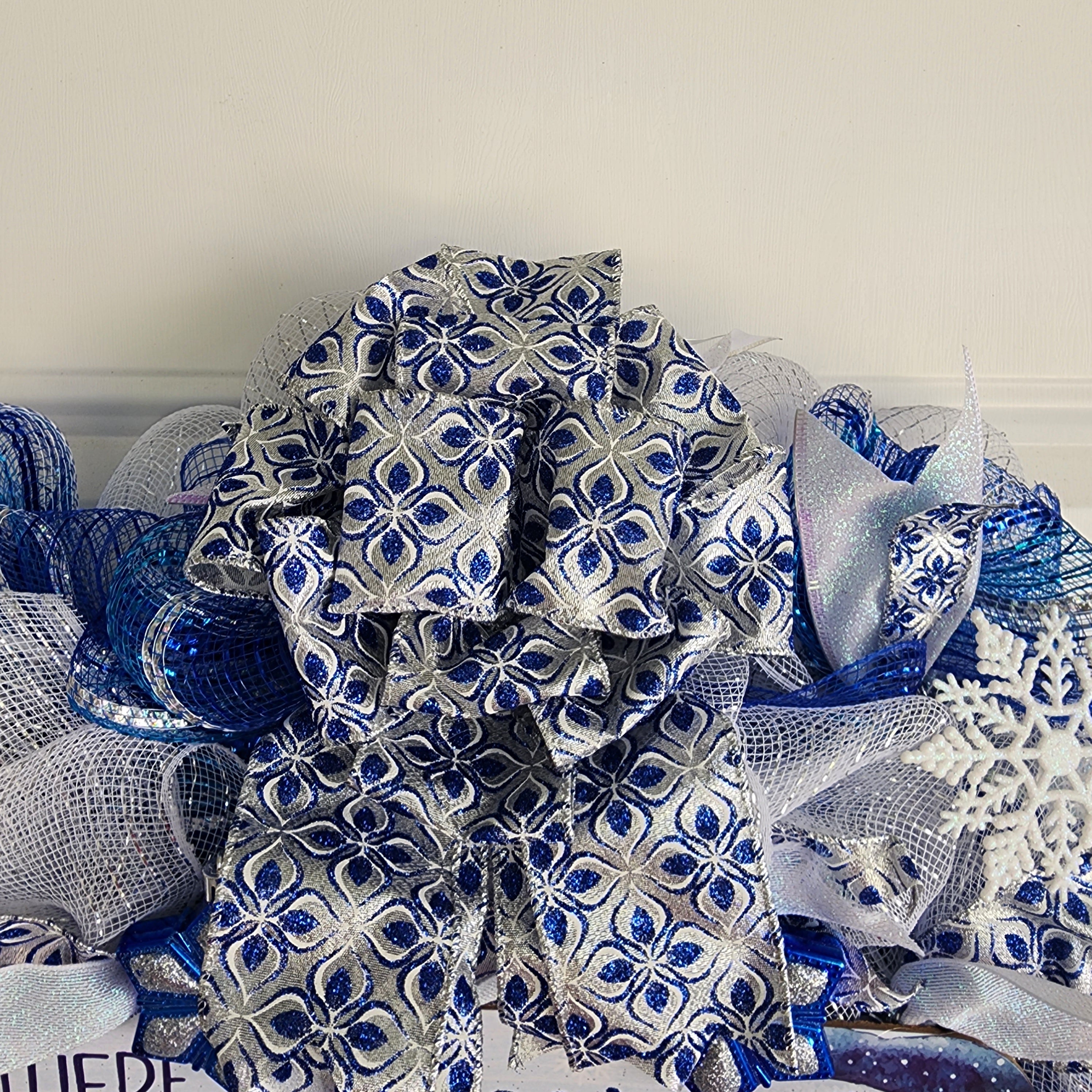 Blue and silver snowflake ornament detail