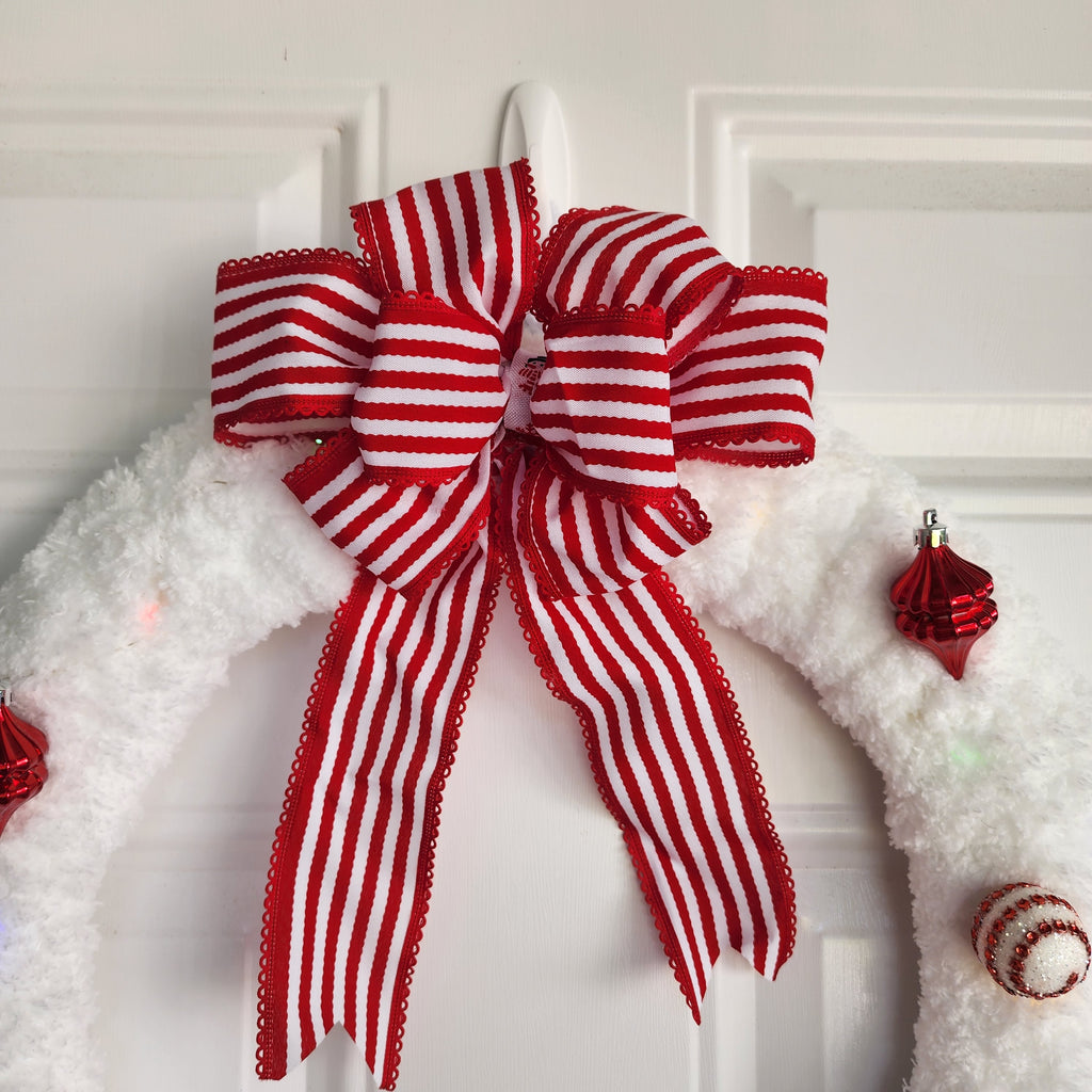 Sparkly white and red beaded ball ornament close-up