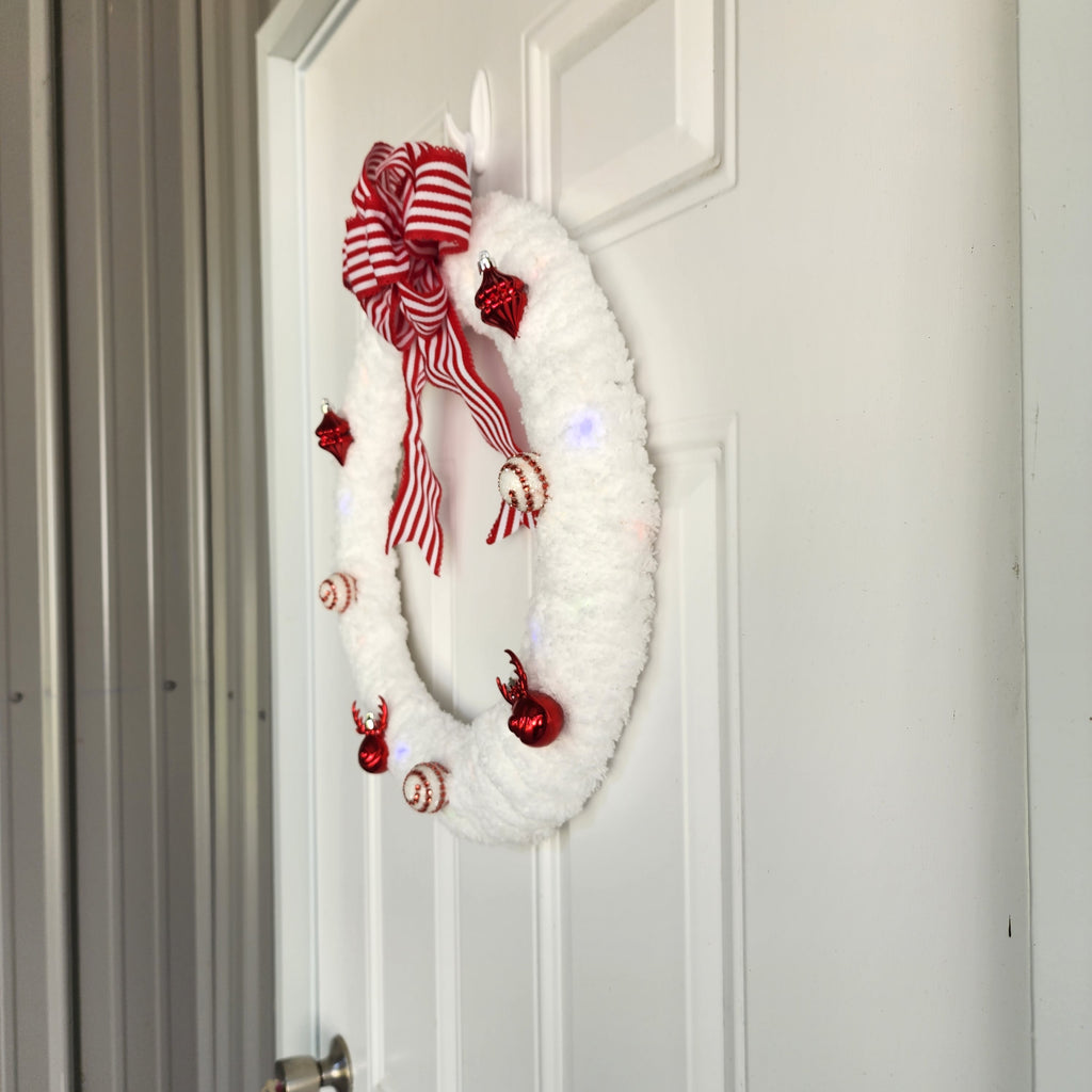 Side view showing candy stripe bow and fairy lights