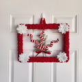 Top corner poinsettia and yarn detail