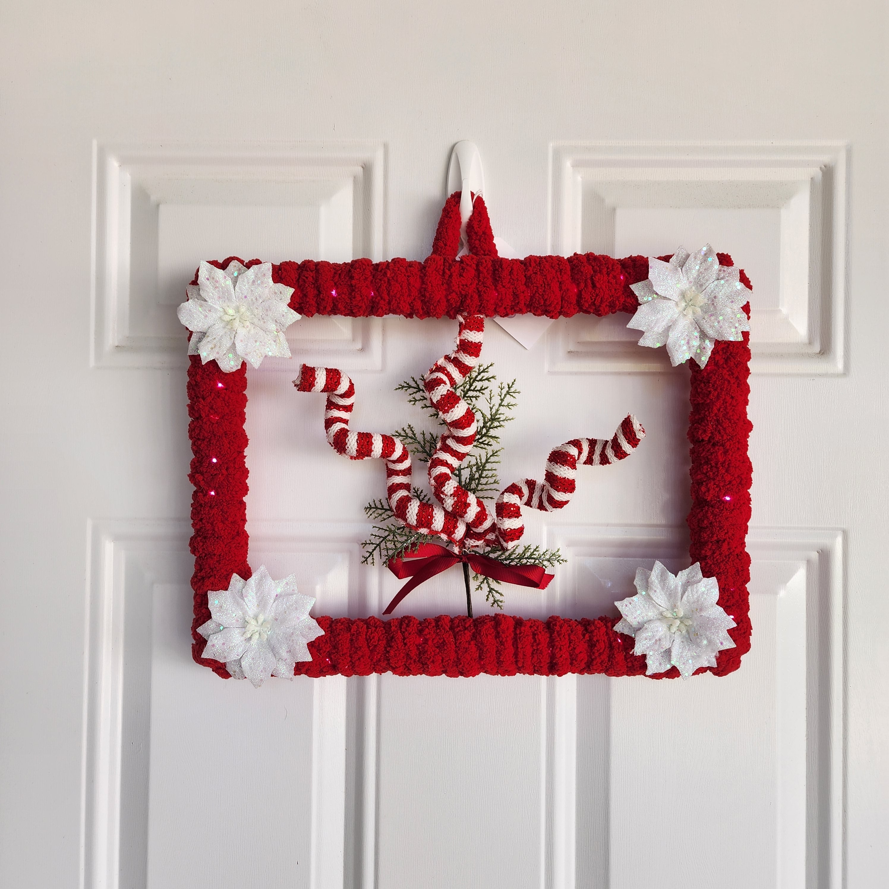 Top corner poinsettia and yarn detail