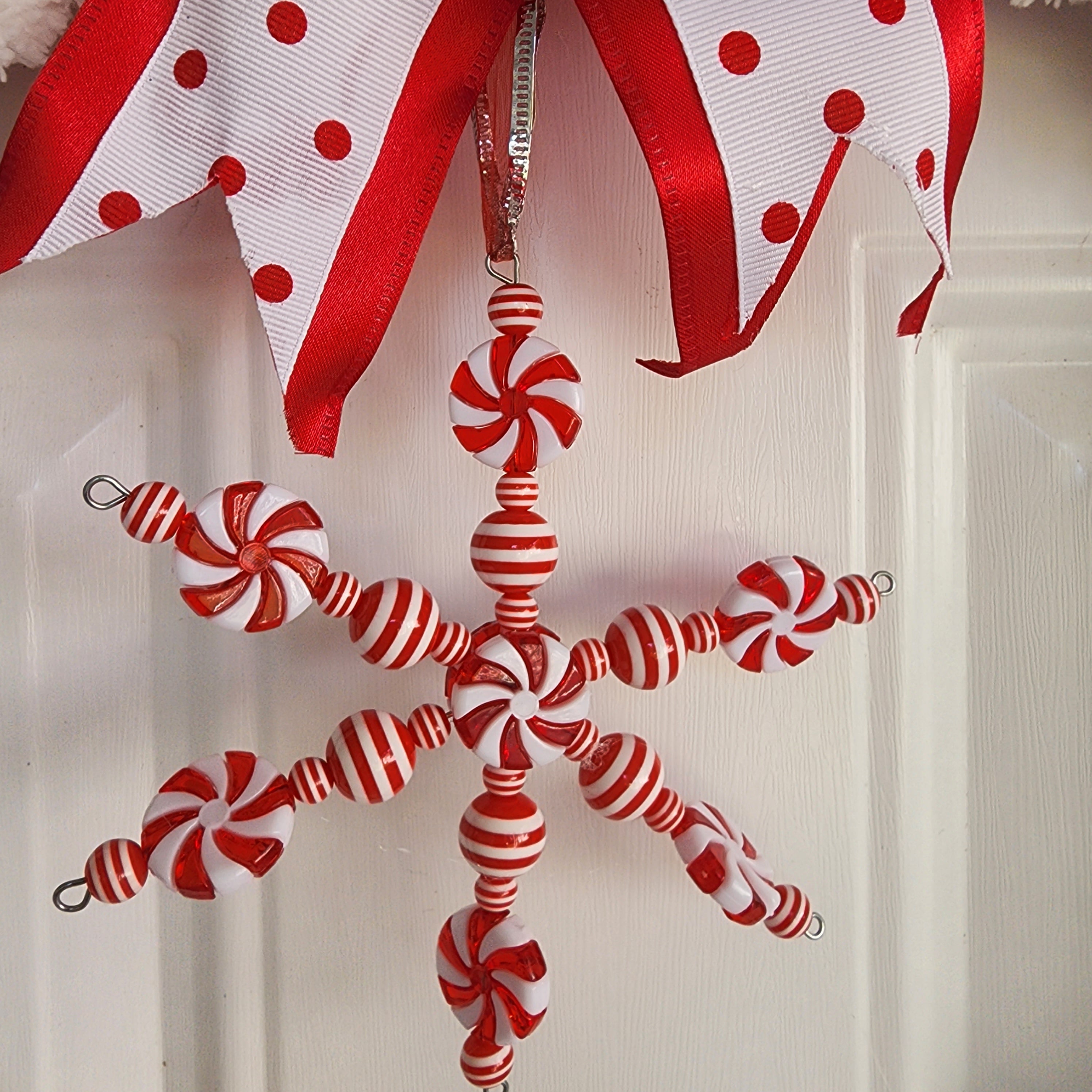 Red polka dot bow and red satin ribbon detail
