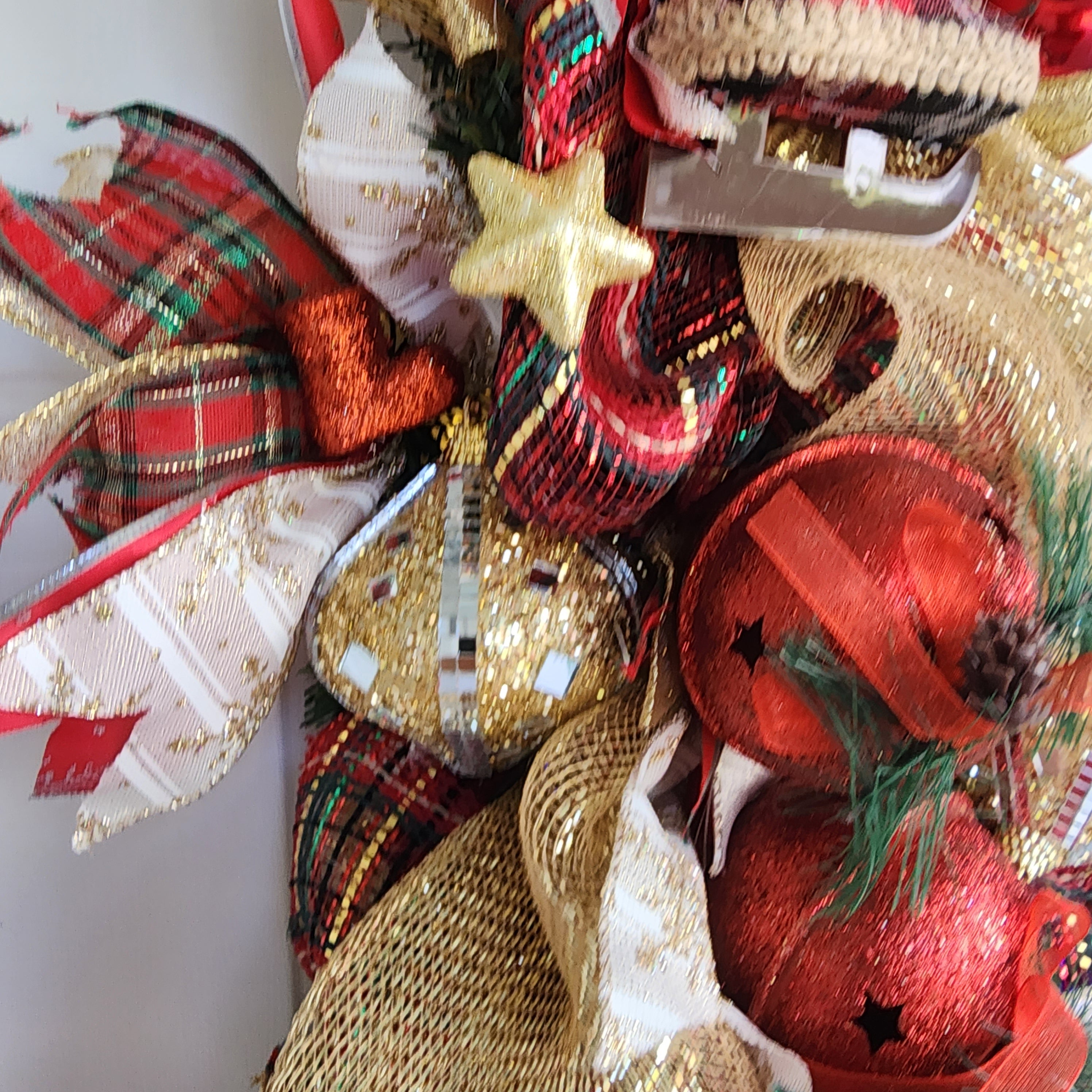 Plaid Christmas stocking centerpiece with pine sprigs