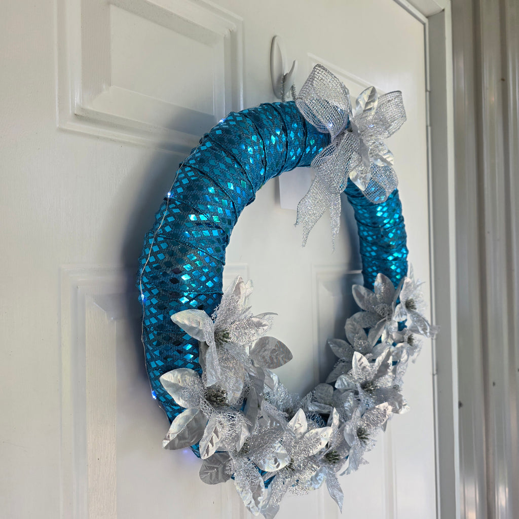 Iridescent teal sequin mesh and fairy lights detail