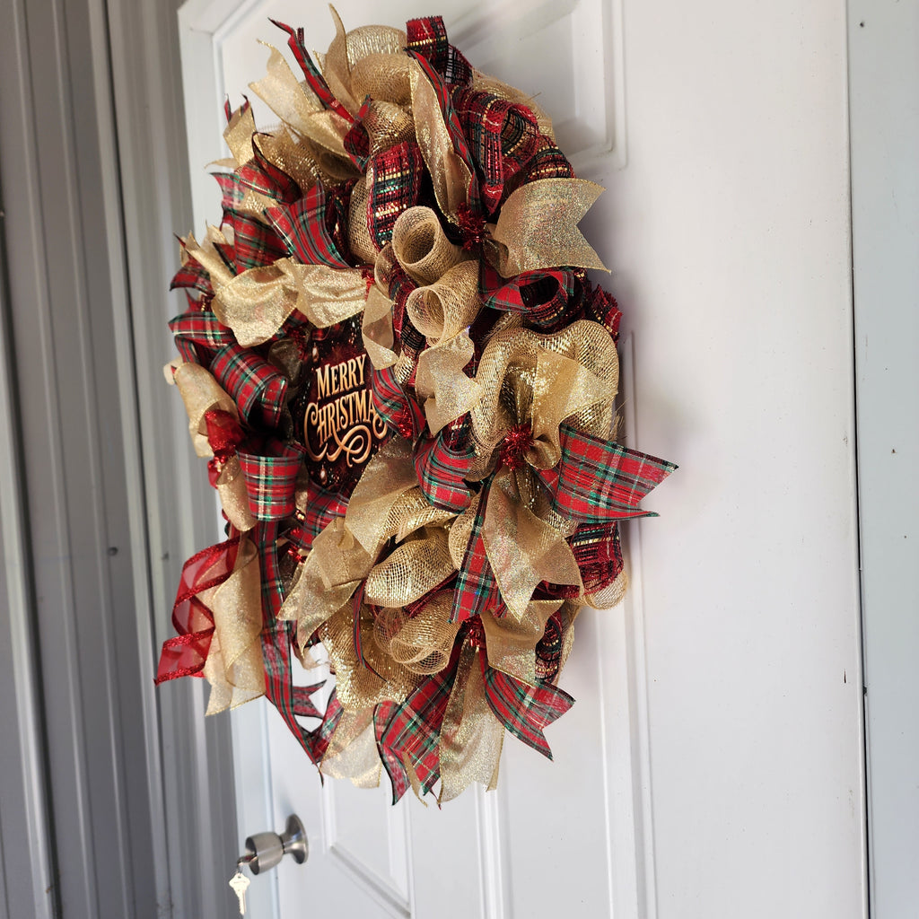 Close-up of tartan plaid and gold ribbon layers