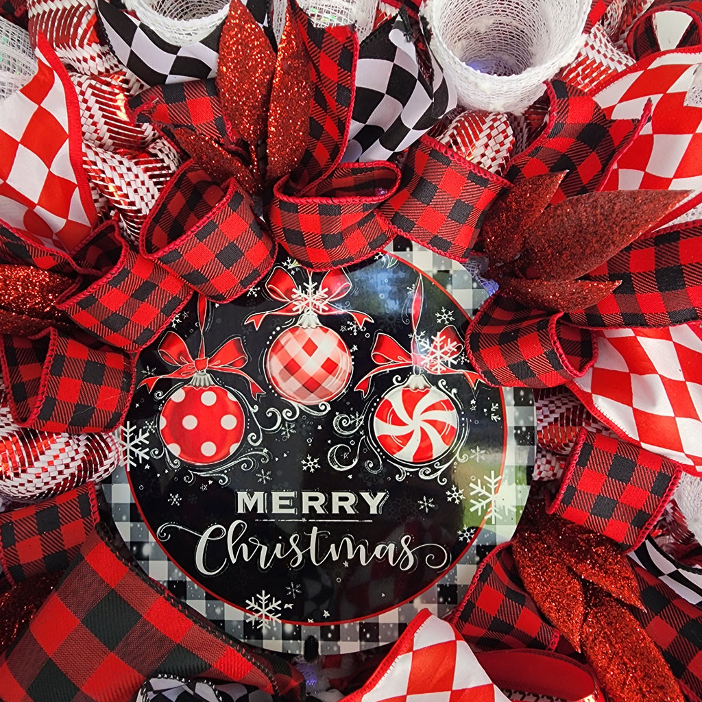 Back of wreath showing clean finish and business card
