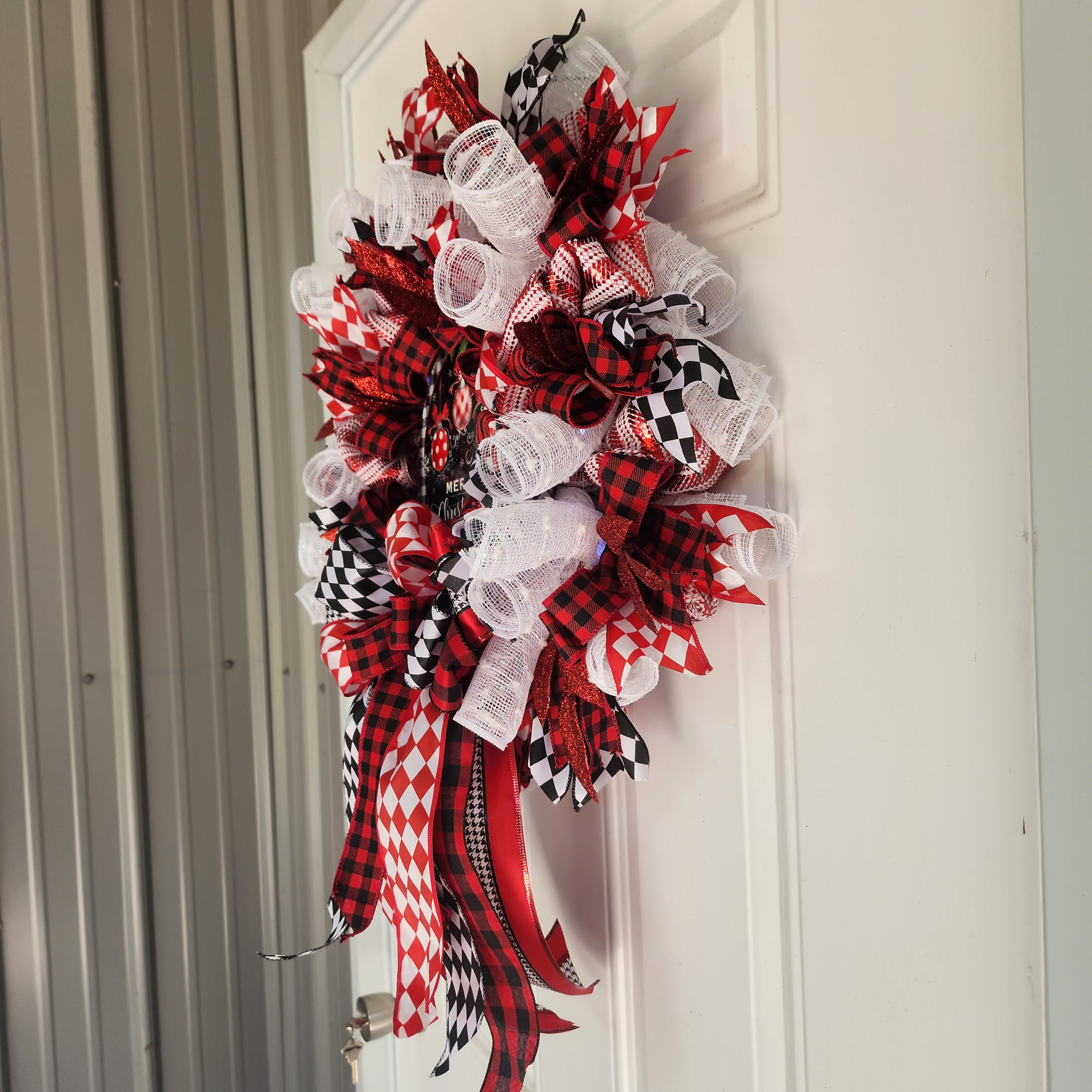 Side angle of Christmas wreath on door