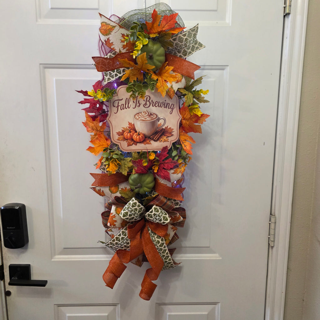 Fall Is Brewing swag on front door - full view