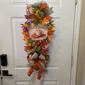 Fall Is Brewing swag on front door - full view