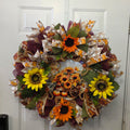 Fall sunflower pumpkin deco mesh wreath on white door - full view