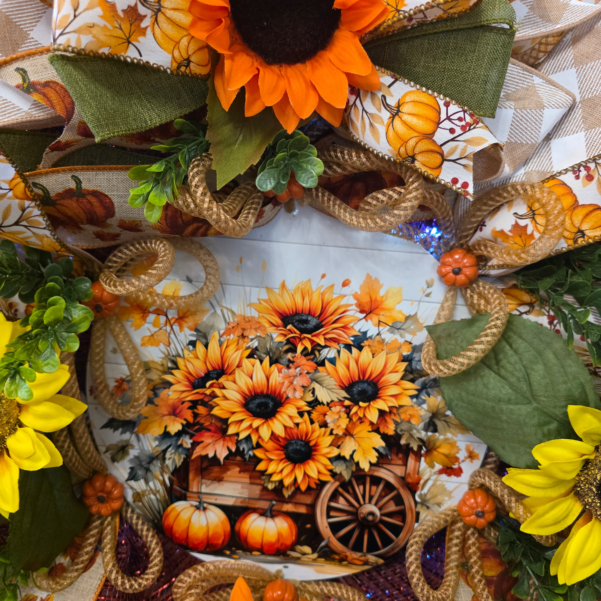 Close-up of yellow glitter sunflower on fall wreath