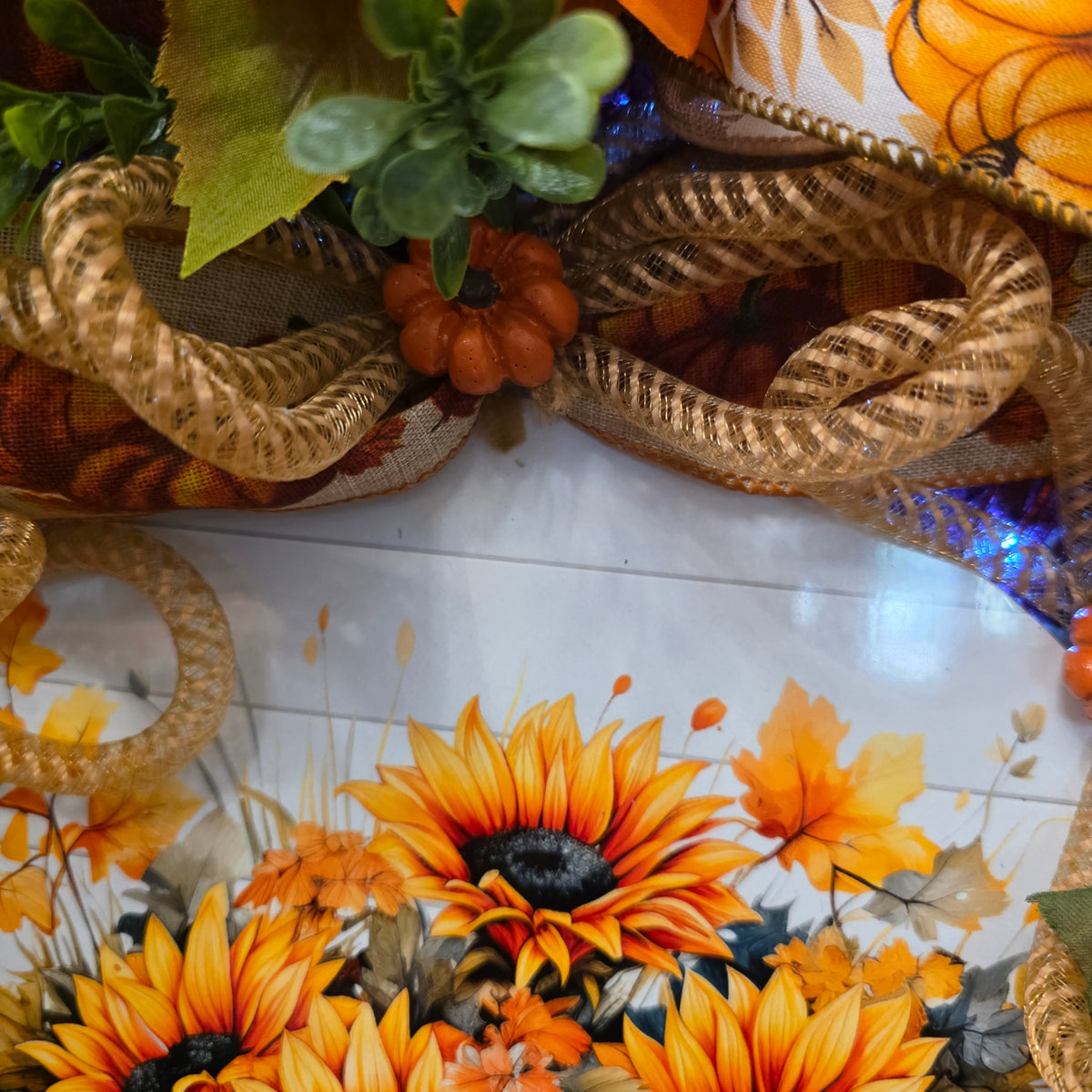 Fall wreath detail with fairy lights and ribbon layers
