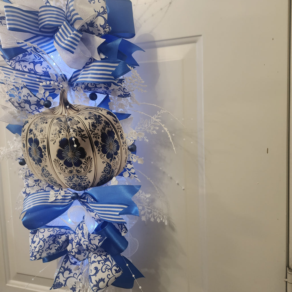 Navy ball picks and white iridescent snowflake spray detail