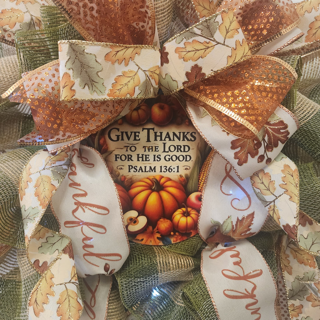 Ribbon bow detail showing copper shimmer and fall oak leaf print