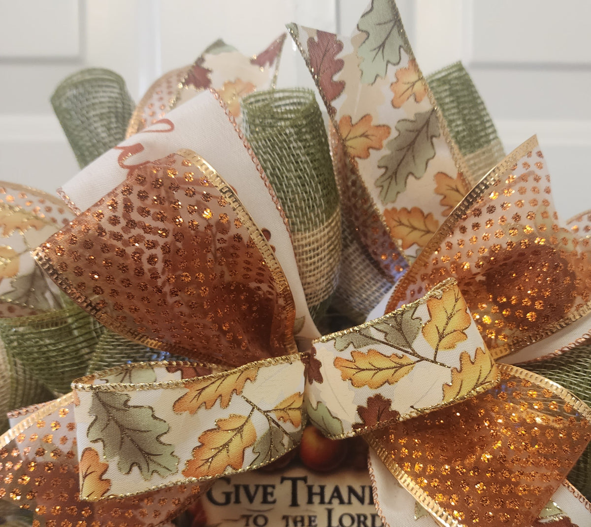 Give Thanks to the Lord Psalm 136:1 center sign close-up