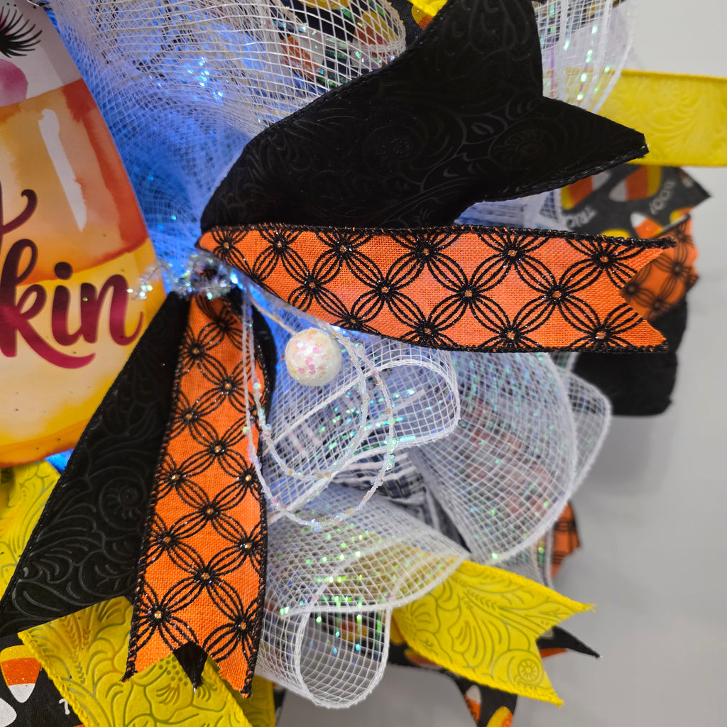 Hey Pumpkin candy corn Halloween wreath on front door - full view
