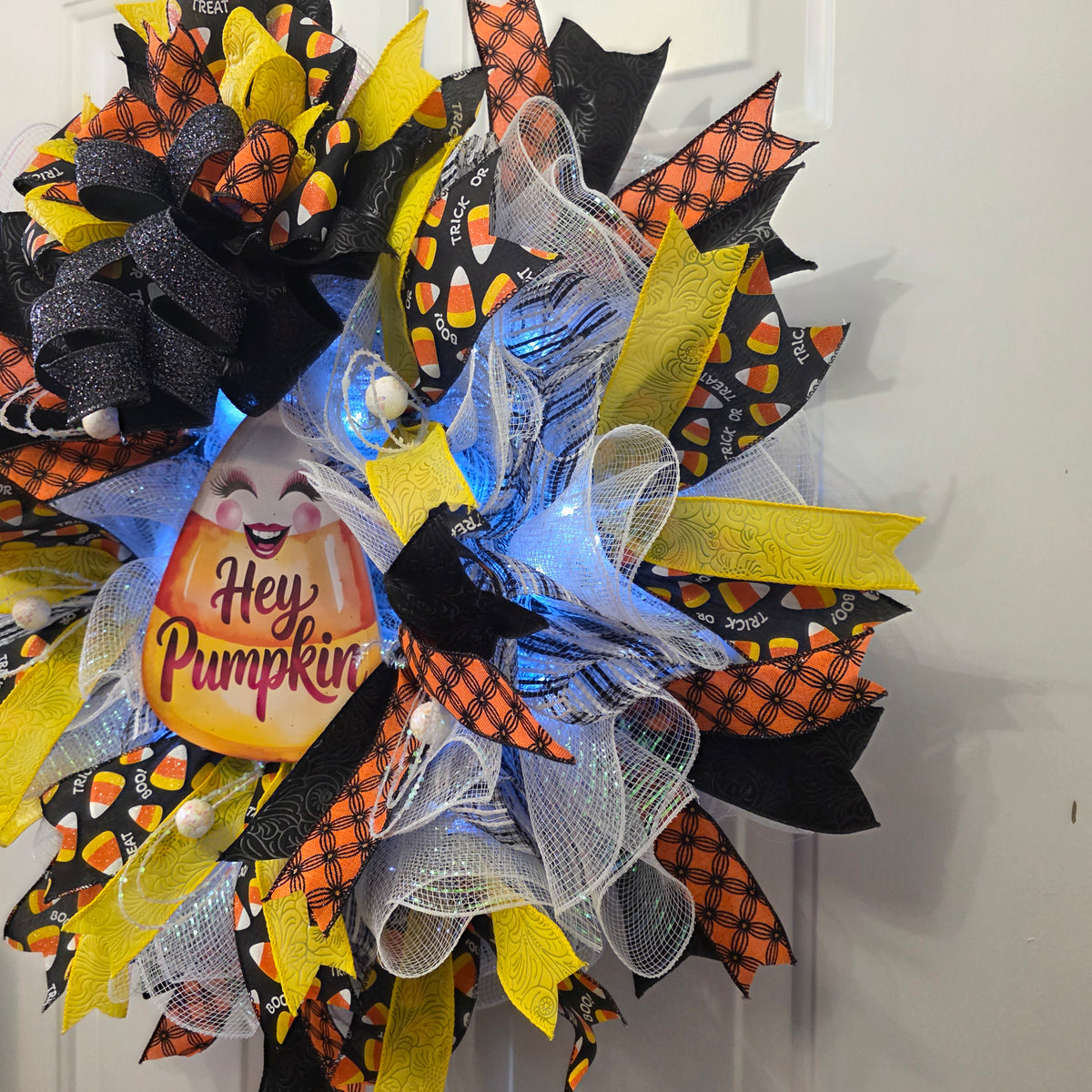 Hey Pumpkin Halloween wreath - close up with fairy lights