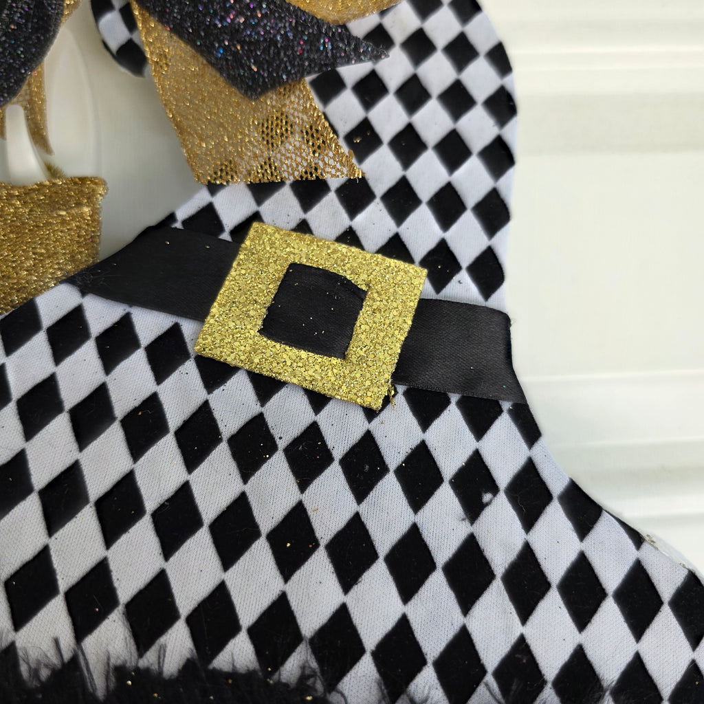 Harlequin Witch Hat LED Pumpkin Wreath - black glitter and gold bow close up
