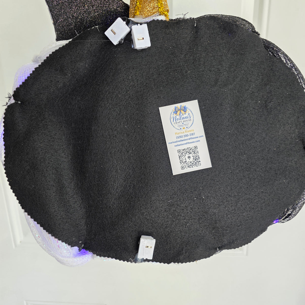 Harlequin Witch Hat LED Pumpkin Wreath - harlequin hat and gold buckle close up