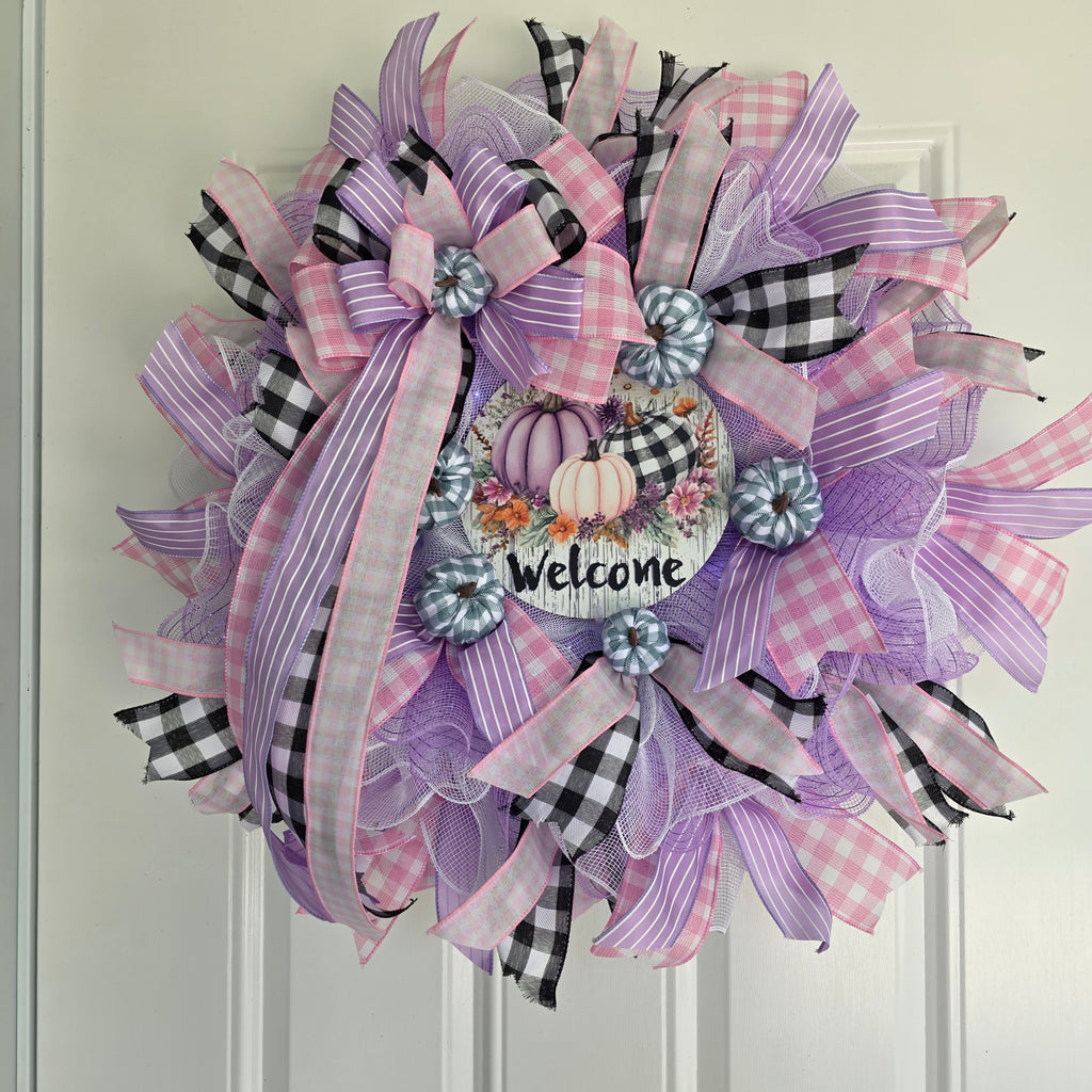 Purple Pumpkin Welcome Fall Wreath - side angle view on white door
