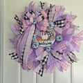 Purple Pumpkin Welcome Fall Wreath - side angle view on white door