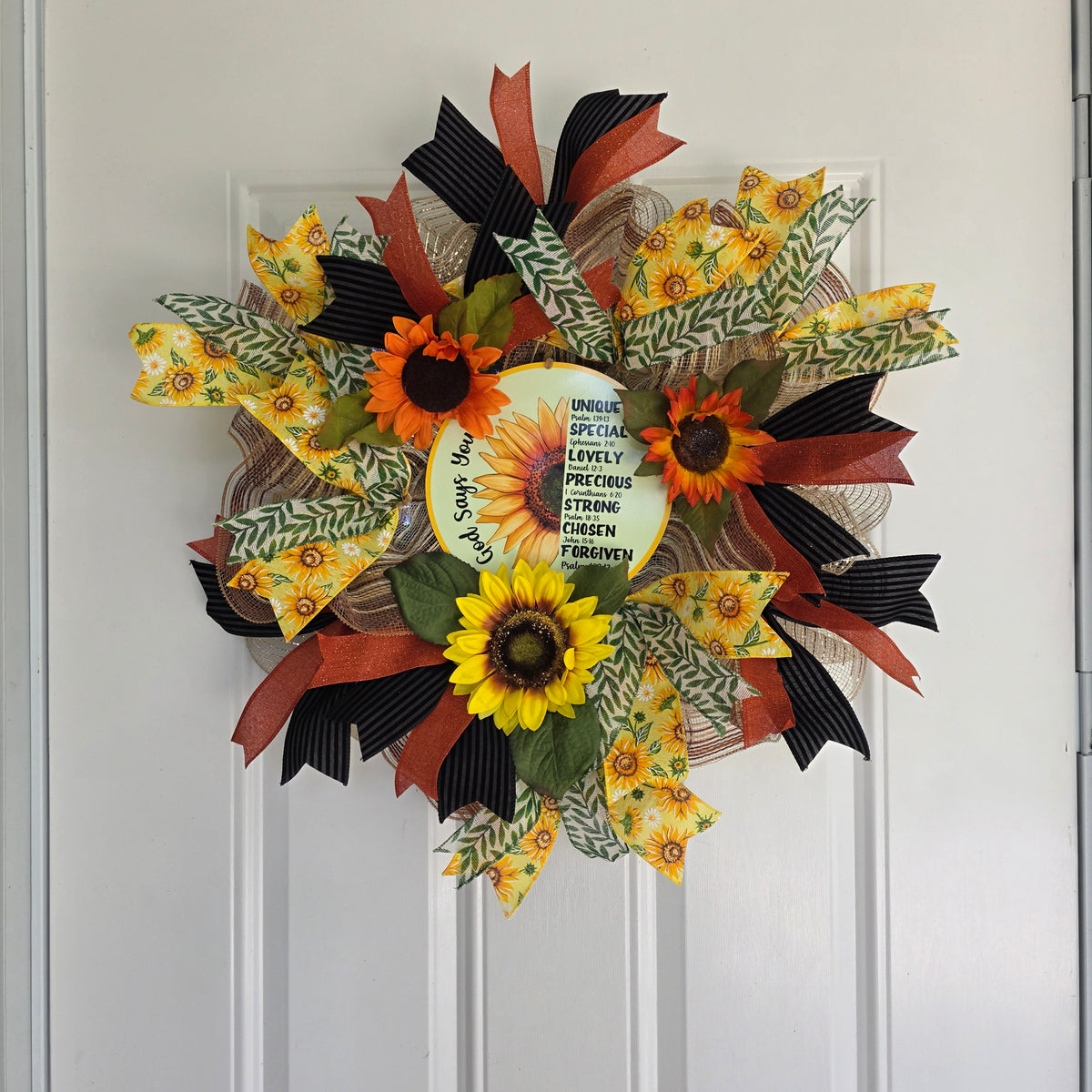 God Says You Are Sunflower Wreath - full front view on white door natural light