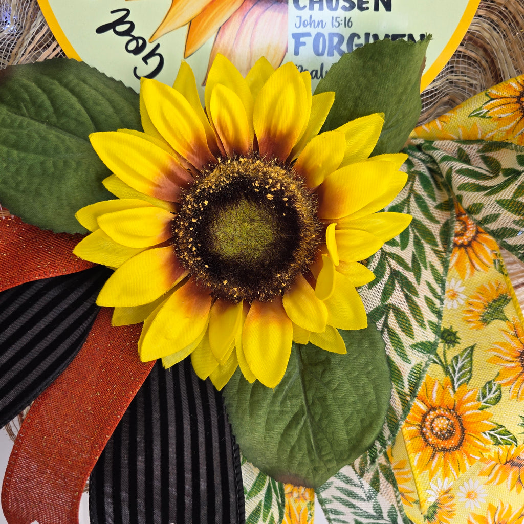 God Says You Are Sunflower Wreath - top view angle on white door