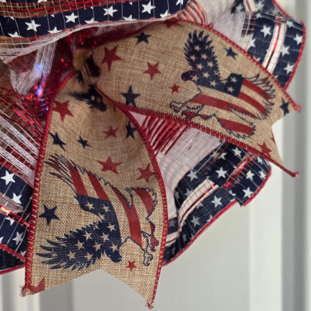 Close-up of burlap eagle and American flag ribbon detail