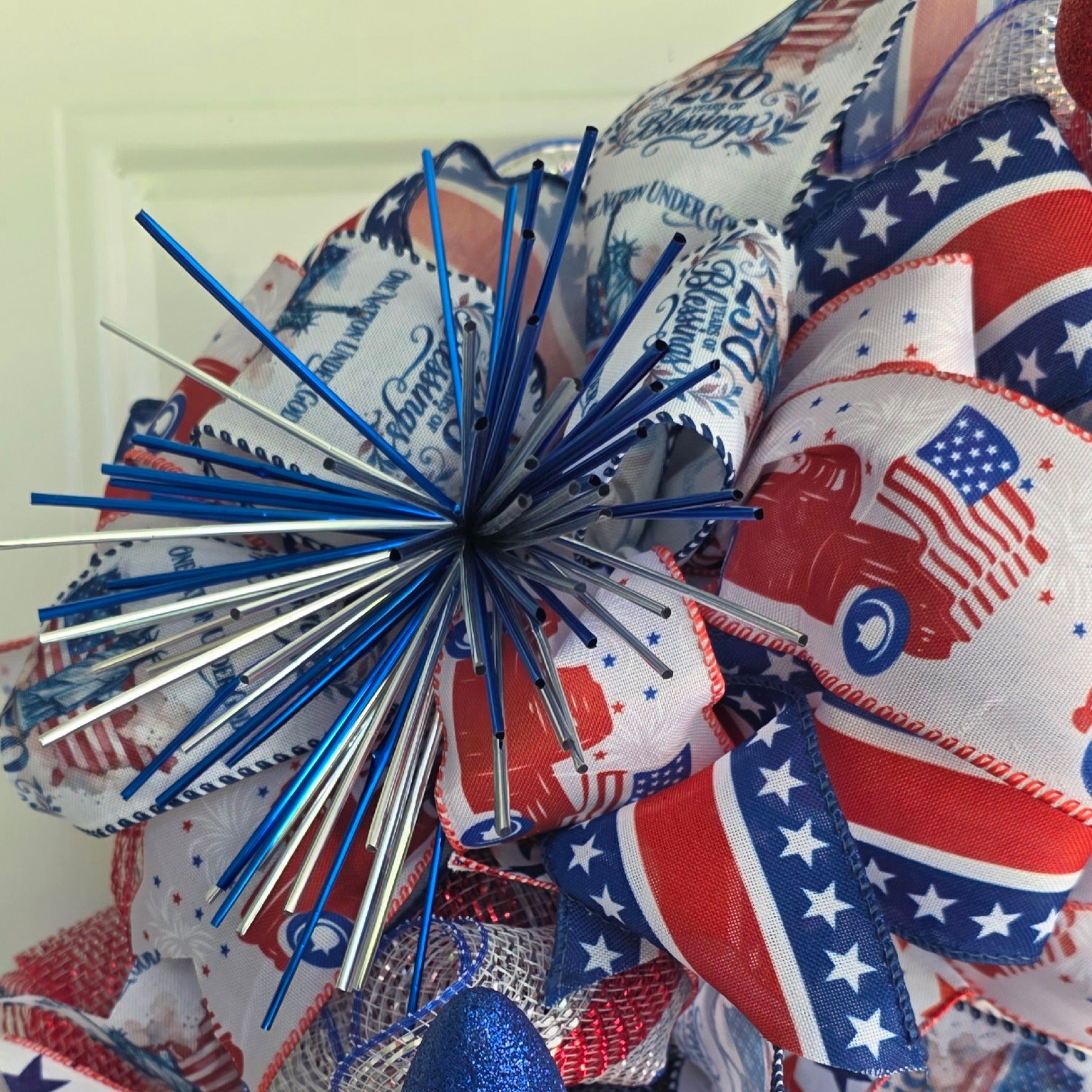 Second bow detail showing One Nation Under God and 250 Blessings ribbon