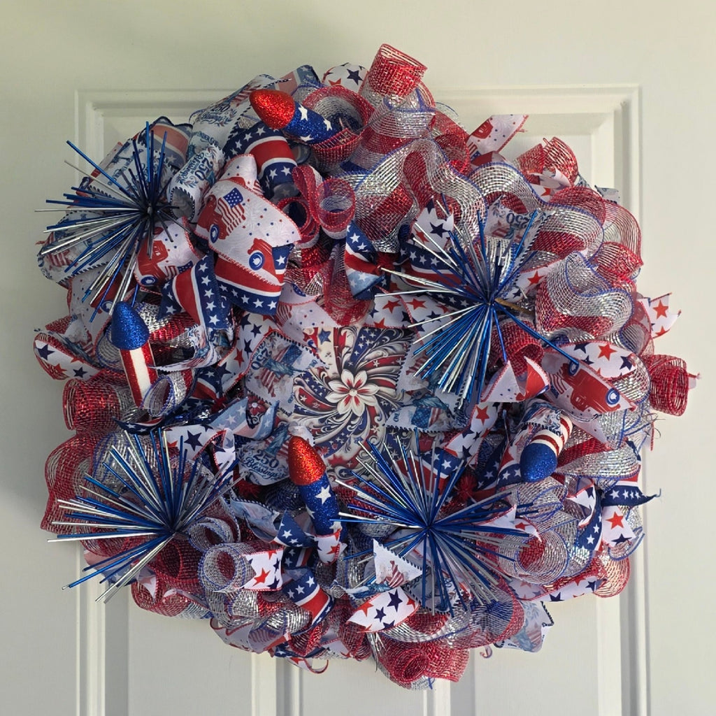 Patriotic fireworks wreath full front view on white door