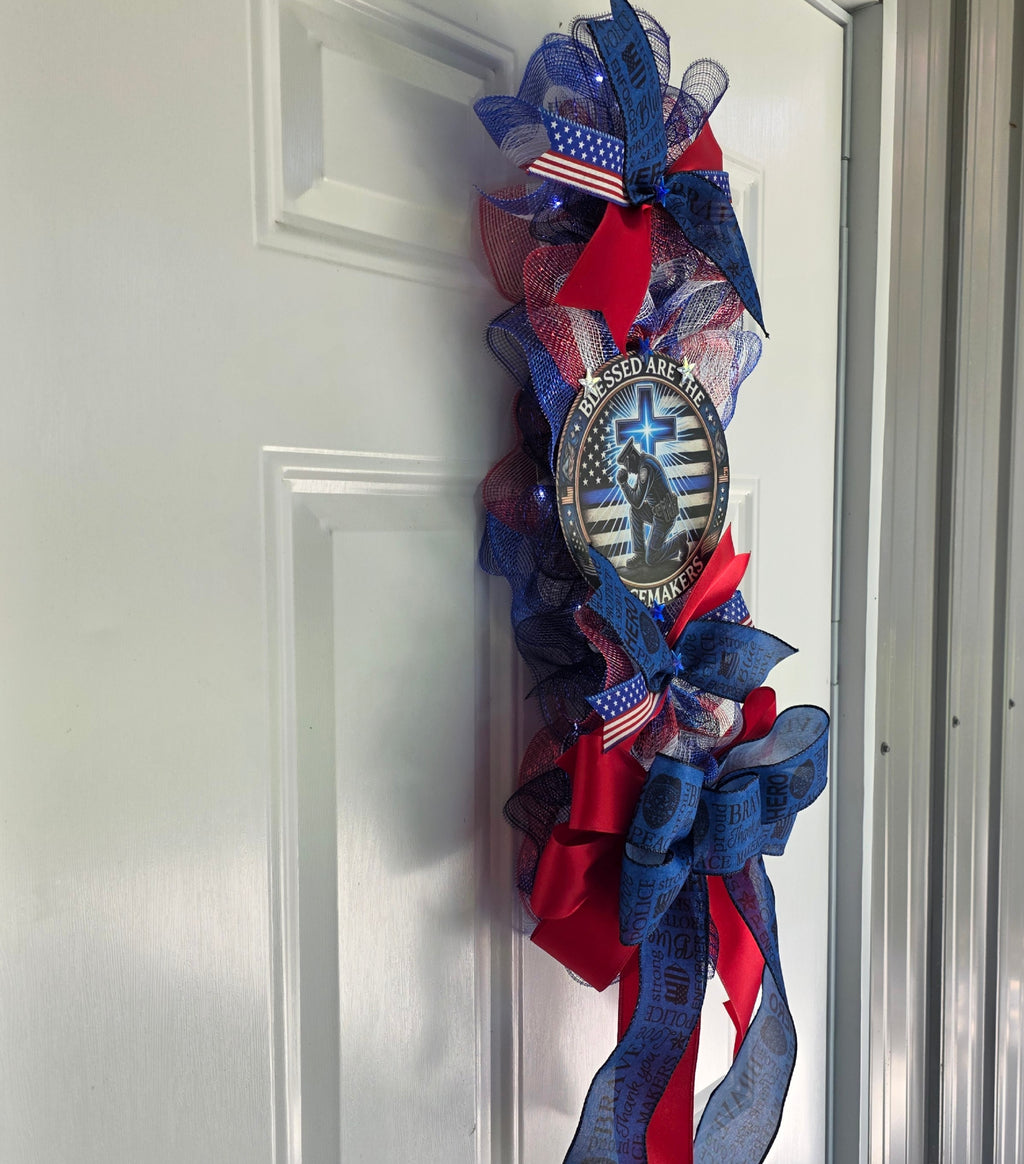 Left side view of Blessed Are The Peacemakers door swag