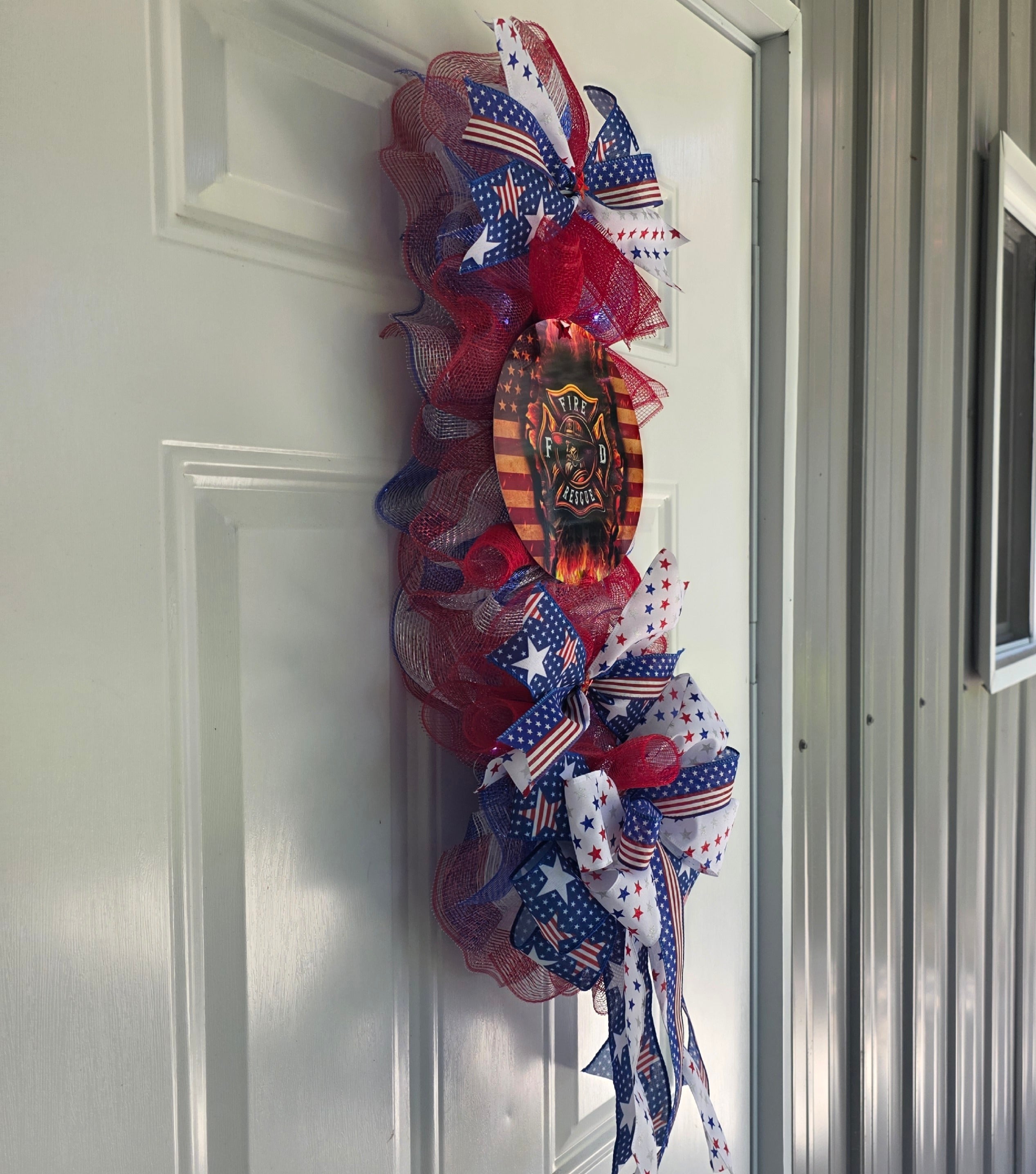 Left side view of Fire and Rescue patriotic door swag
