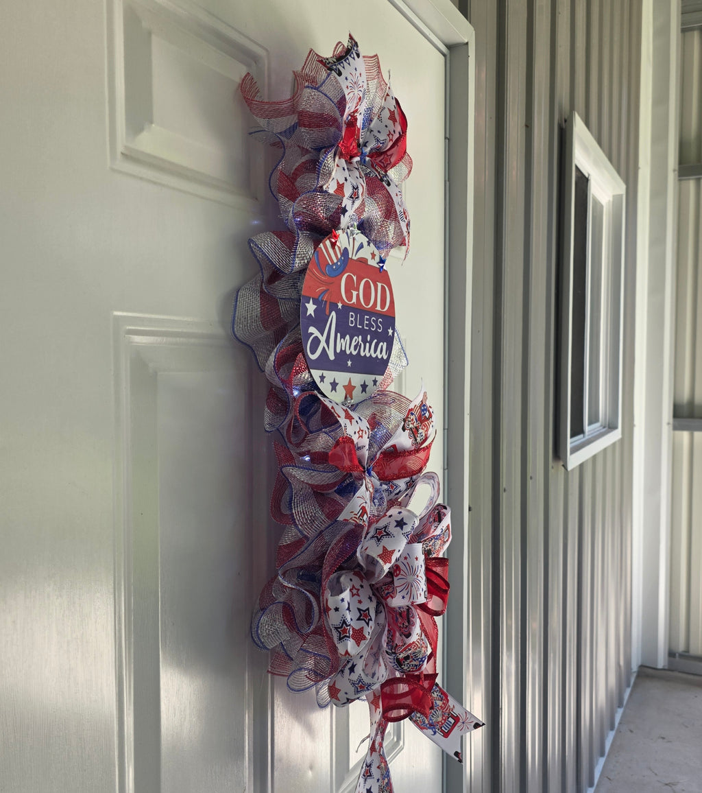 God Bless America patriotic door swag full view on white door