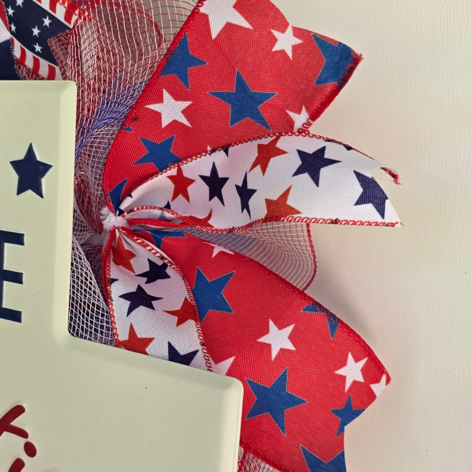 Close-up of red star wired ribbon detail