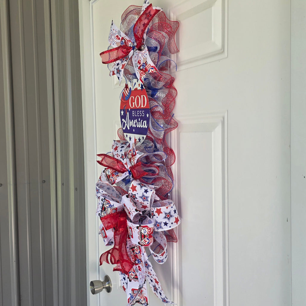 Right side view of God Bless America patriotic door swag