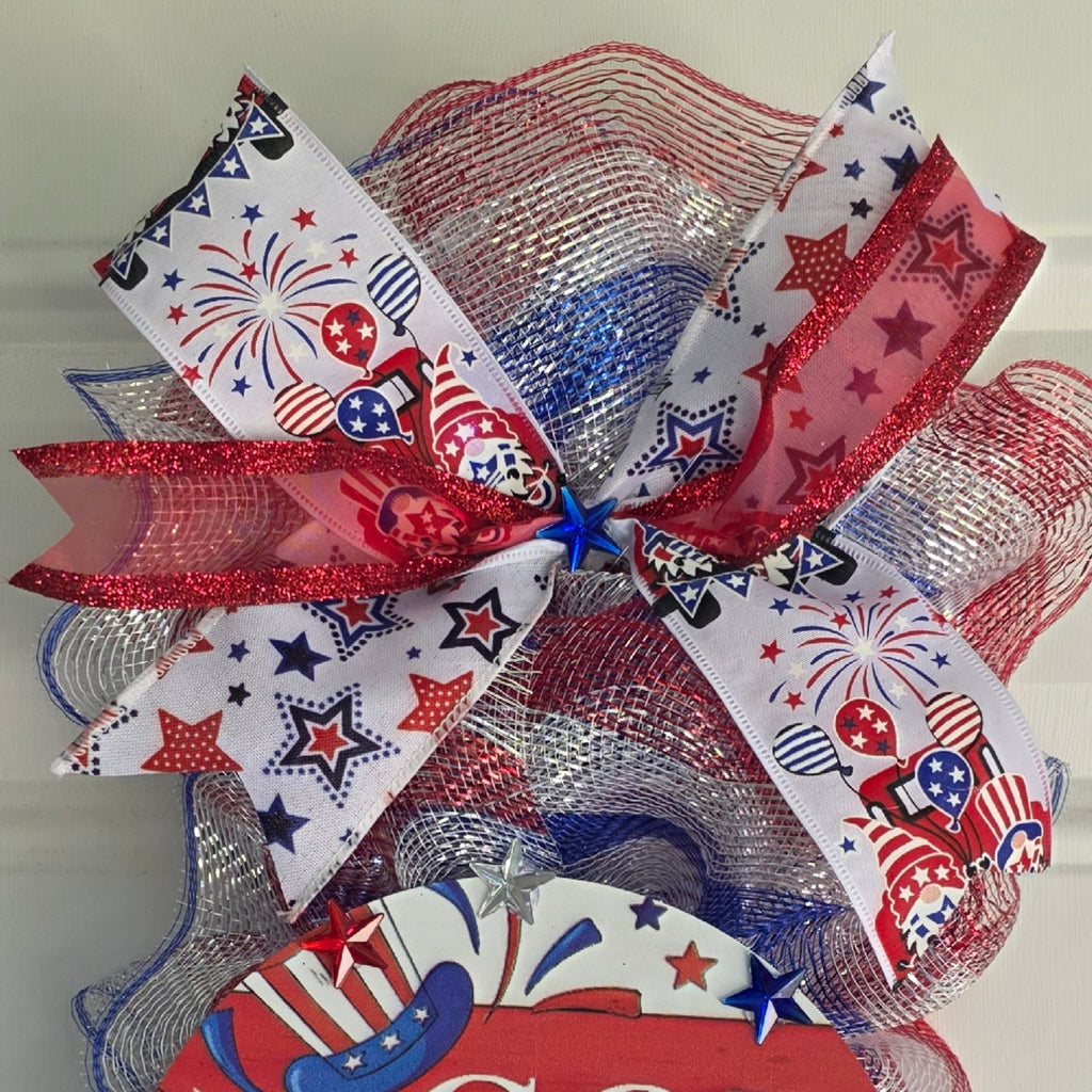 Top ribbon detail showing layered patriotic wired ribbons